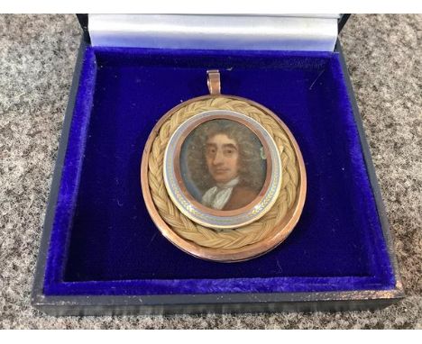 English School, 18th Century, a portrait miniature of  Mr David Gaston, in a full bottomed wig, mounted in rose-coloured meta