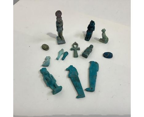 Egyptian antiquities: a standing aubergine glazed figure of Sekhmet, a turquoise glazed figure of Tawaret, a blue glazed scar