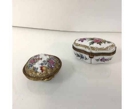 A Dresden gilt-highlighted enamel painted clam shell-form box, late 19th century, polychrome decorated with floral sprays, wi