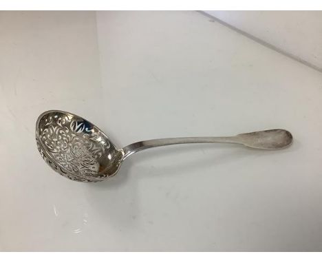 A French silver sifting ladle, c. 1800, Paris marks, 950 standard, with fiddle terminal and pierced circular bowl. Length 20c