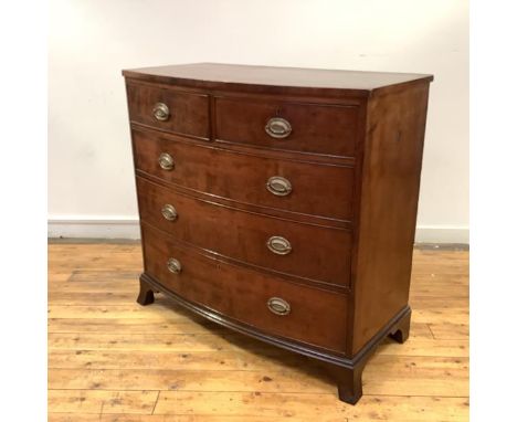A Regency mahogany bowfronted chest, two short and two long drawers, raised on splayed bracket feet. 100cm by 104cm by 52cm
