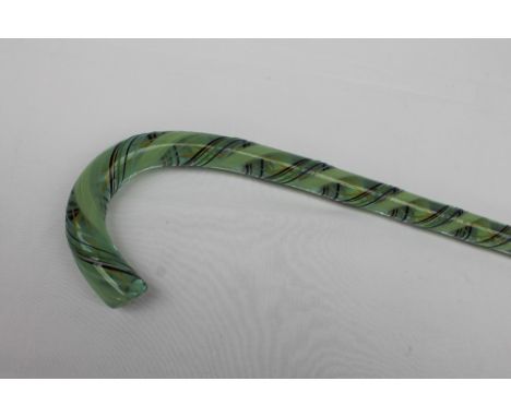 A glass walking stick with coloured glass twists, internally and externally, (possibly from the Nailsea glassworks), 105cm lo