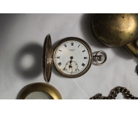 A George V silver half hunter pocket watch, the enamel dial with Roman numerals and a seconds subsidiary dial inscribed J W B