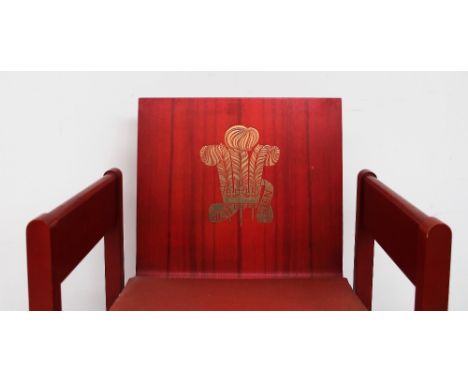 The Earl of Snowden and Carl Toms, a red painted beech and laminate elbow chair produced for the Investiture of the Prince of