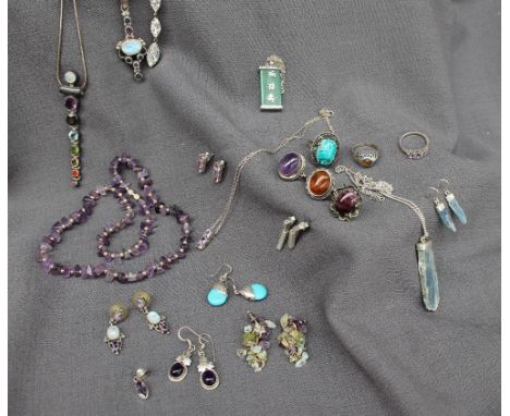 An irregular amethyst necklace together with assorted amethyst jewellery, semi precious stone set necklaces, rings etc