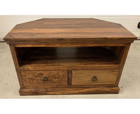 A dark Indian rubberwood corner TV/media unit with shelf and 3 drawers. Approx. 56 x 90 x 52cm.