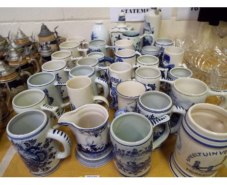 Delftware - A large collection of a blue and white Delftware tankards