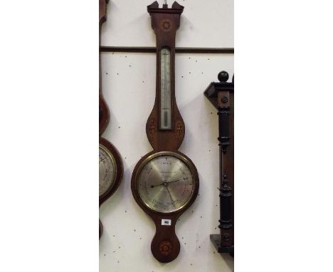 A 19th century mahogany case banjo style barometer, thermometer and hygrometer, the case with inlaid shell and floral decorat