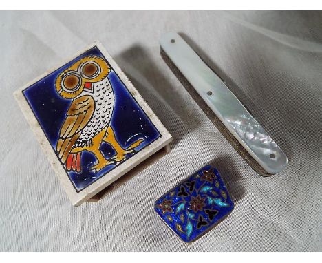 A small cloisonne pill box, a ceramic matchbox holder and a pen knife with mother of pearl handle