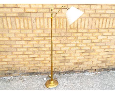 A brass reading lamp, 148cm (h)