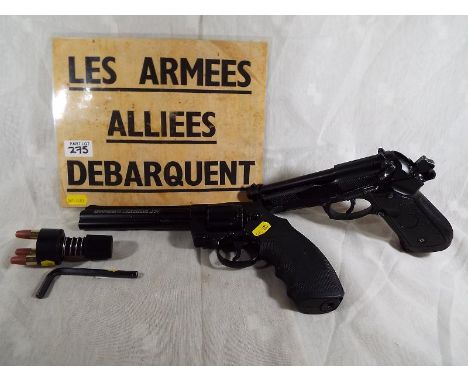 A Swiss army 0.357 with fassloader and Allen key, and a reproduction Beretta hand gun, 6mm and an Eisenhower notice (qty)