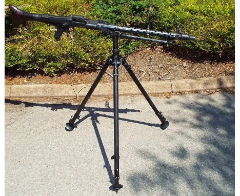 A World War Two (WWII) MG 34 (Maschinengewehr 34) light machine gun 7.94mm complete with anti aircraft tripod and AA sights. 