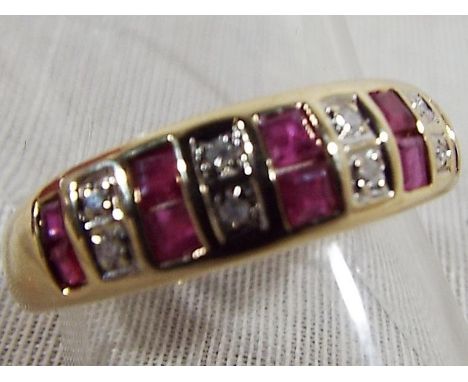 A lady's 9ct gold ruby and diamond ring, size O and a half, approx weight 2.19grams Est £30 - £50