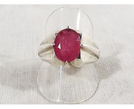 A gentleman's Eastern silver ring set with large ruby centre stone, size W, unmarked but tested as silver Est £80 - £120