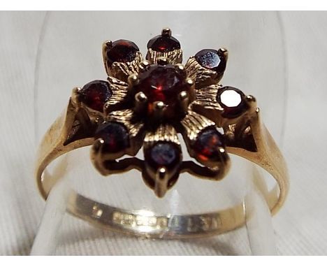 A lady's 9ct hallmarked gold ring, set with ruby cluster, size N, approximate weight 2.09 grams