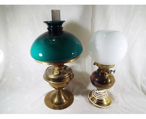 An oil lamp with glass funnel and diffuser, 50cm (h) and a table lamp in the form of a oil lamp with glass diffuser, 42cm (h)