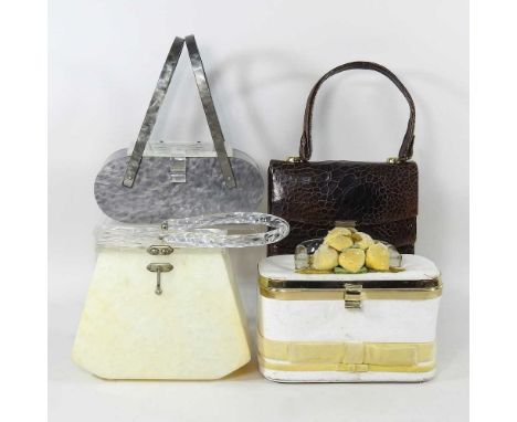 A mid 20th century bakelite ladies handbag, together with two others and a crocodile skin bag (4)All are complete, usable and