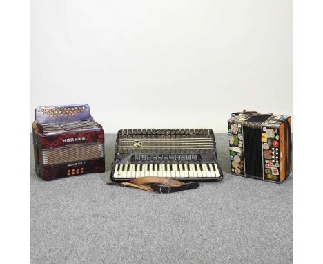 A Hohner Atlantic IV accordion, together with two others (3)