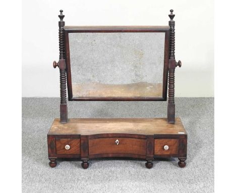 A George III mahogany swing frame toiletry mirror. Note: a non-transferable ivory exemption certificate has been granted for 