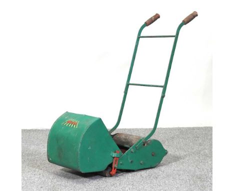 A vintage Webb miniature push along toy lawn mower