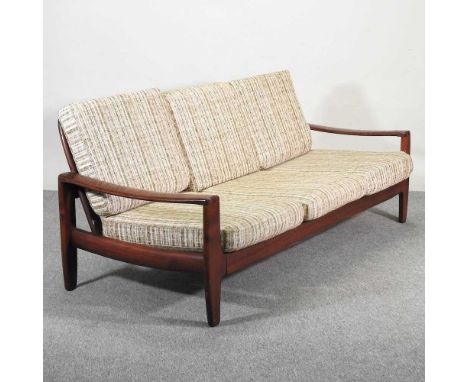 A 1970's Danish style teak three seater sofa, with loose cushions193w x 83d x 71h cm