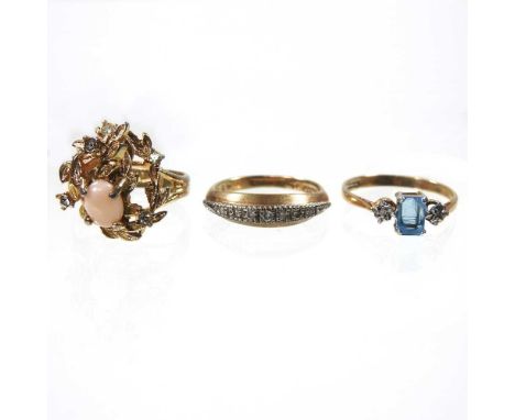 A 9 carat gold diamond ring, 2.6g, size M, together with a coral dress ring, size L and a 9 carat gold aquamarine and diamond