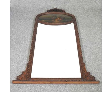 A large continental gilt framed trumeau mirror, with an inset panel depicting a courting couple, 180 x 104cm