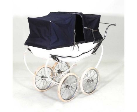 A 1960's vintage doll's pram, 97cm long104w x 48d x 83h cm