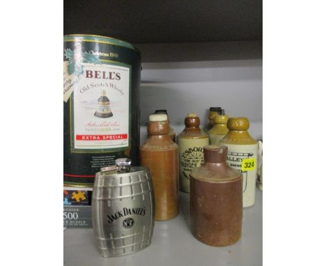 Usborne terracotta ginger beer bottles with others, together with a Bell's Whisky bell decanter (empty of contents)