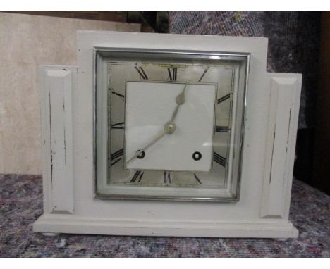 An Art Deco Garrard painted mantle clock