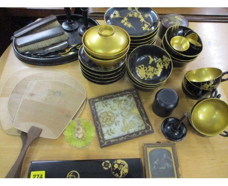 20th century black lacquered oriental items, an ebonized dressing table set, three oriental fans, a framed silk panel, a Depo