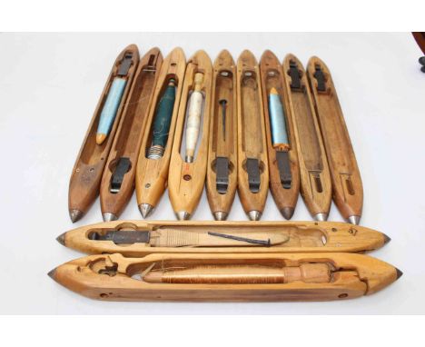 Collection of eleven vintage loom shuttles.