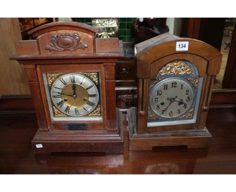 Two Edwardian bracket clocks, each with brass and silvered dials.