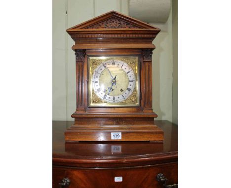 Victorian bracket mantel clock with quarter chimer, 42cm high.