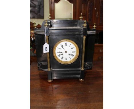 Edwardian ebonised and slate and brass column mantel clock with enamel dial.