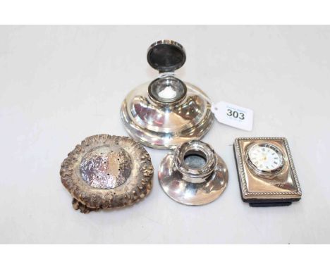 Four silver pieces comprising Capstan inkwell, pen stand, boudoir clock and hat pin stand.