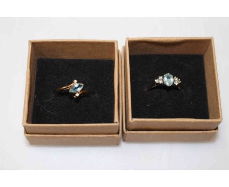 Two aquamarine and diamond 9 carat gold rings, size O and K.