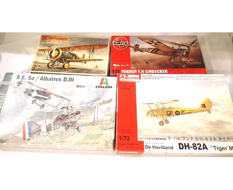 Four 1/72 scale bi-plane and WWI kits includes, Tiger Moth, Albatros, Eindecker, Boeing P-12E, contents unchecked. P&amp;P Gr