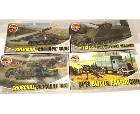 Four Airfix military related 1/72 scale Sherman, Churchill, M113, Opel Blitz, contents unchecked. P&amp;P Group 1 (£14+VAT fo