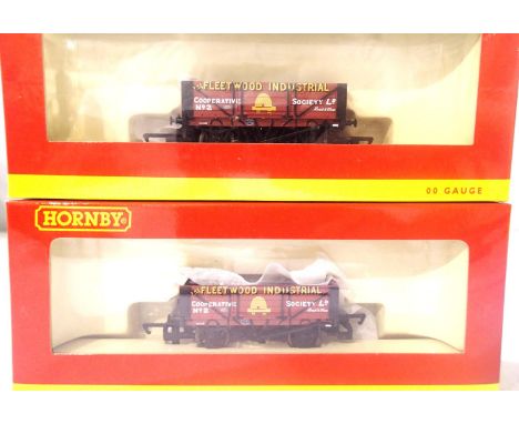 Two Hornby R6592 four plank wagons Fleetwood Industrial Cooperative in very near mint condition, boxed. P&amp;P Group 1 (£14+