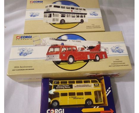 Three Corgi Classics; Manchester Evening News Bus 97392 - Simon Snorkel fire engine, 97828 - Daimler Fleetlive - Rochdale, in