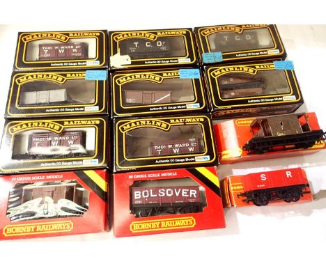 Selection of OO scale wagons, twelve, Mainline &amp; Hornby, mostly fair to good condition, boxed. P&amp;P Group 2 (£18+VAT f