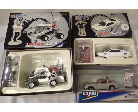 Three Corgi James Bond related models 65001 - Lotus Esprit, 65201 - Moon Buggy 94060 - Aston Martin, in excellent condition, 
