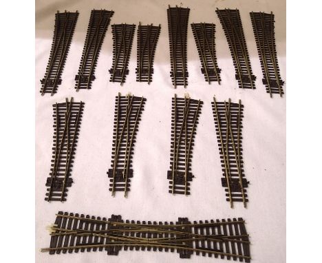 Thirteen Peco points OO scale, includes double slip, mostly in good/used condition, unboxed. P&amp;P Group 1 (£14+VAT for the