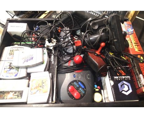 Vintage gaming including ten Nintendo 64 cartridges, Sega items, mixed controllers/accessories. P&amp;P Group 3 (£25+VAT for 