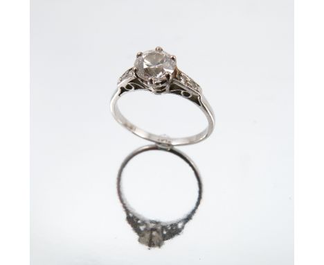 A diamond single stone ring, stamped 'Plat', the old brilliant transitional cut stone measuring approximately 6mm by 3.6mm de