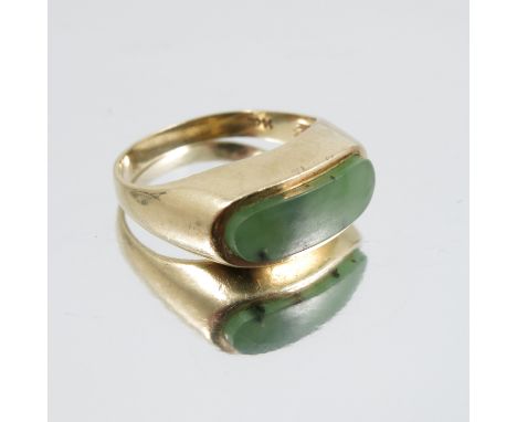 A nephrite jade set ring, stamped '14ct', finger size L, 3.9g gross