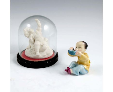 A Royal Worcester figure, China, modelled by Freda Doughty, from the Countries of the World series, dated circa 1962, height 