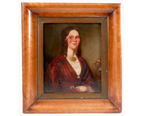 An oil on canvas, portrait of a woman in Victorian dress, 12ins x 9.5ins, in a swept birds eye maple frame