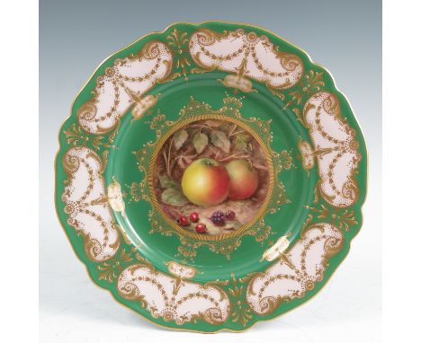A Royal Worcester plate, decorated with a central fruit panel of two apples, blackberries and flower by Richard Seabright, to